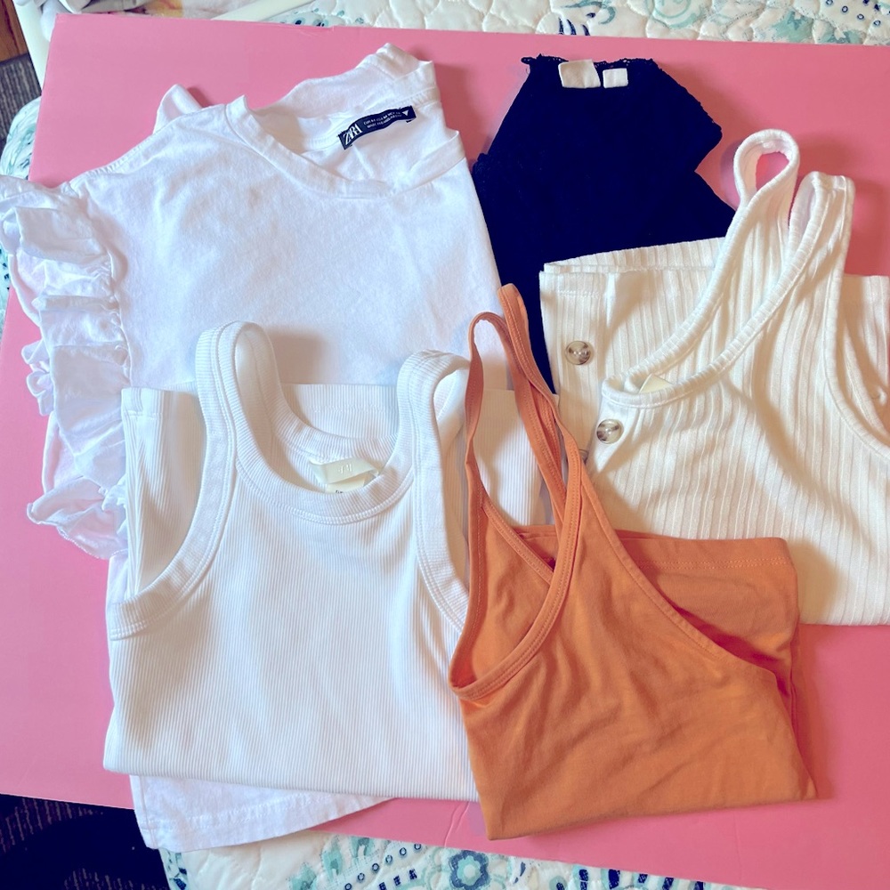 4 t-shirts and a blouse